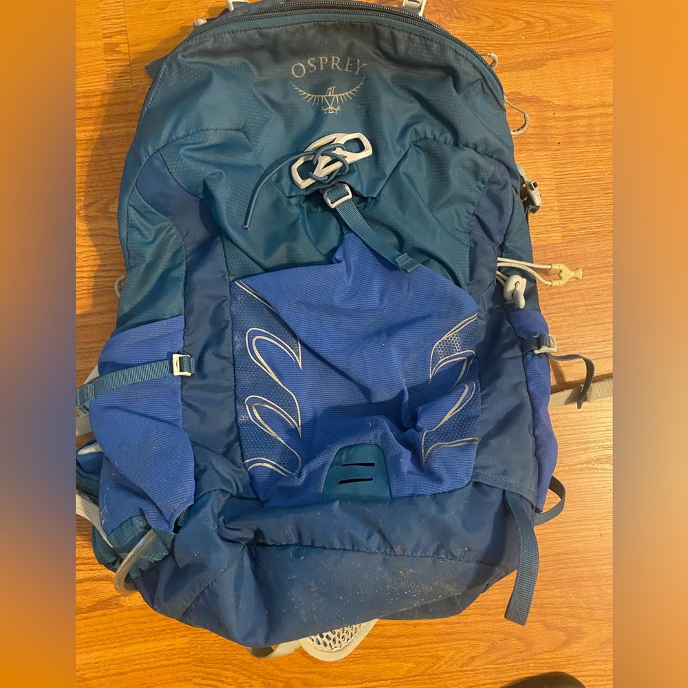 Osprey backpack 22L. Used on adventures, travel bike riding everyday use.
